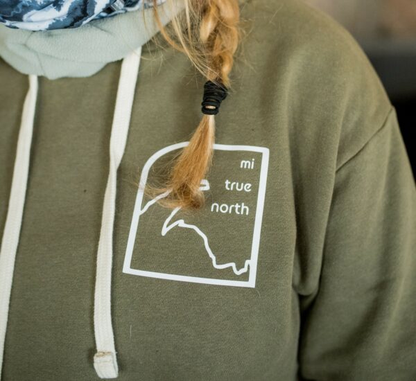 product photo of Mi True North design on a military green hoodie