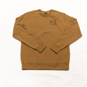 A camel crew sweatshirt with a small black design in the upper left chest area